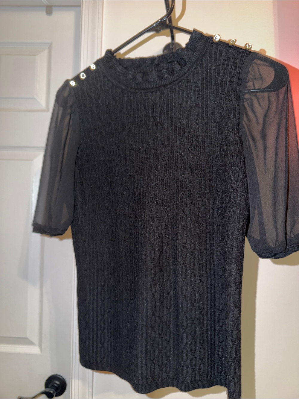 Black Knit Blouse with Sheer Puff Sleeves and Gold Button Accents